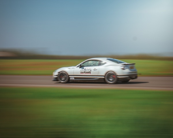 Toyota GT86 track day experience - portrait view of car and driver preparation