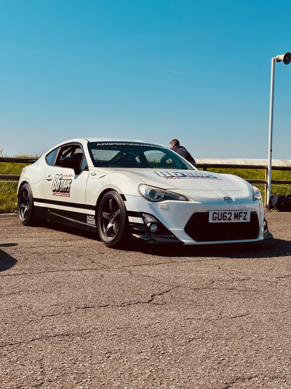 Toyota GT86 track performance - vertical action shot showcasing track capabilities